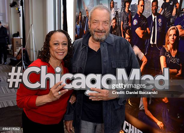 Actress S. Epatha Merkerson and Executive Producer Dick Wolf pose with a #ChicagoFire hashtag at a press junket for NBC's 'Chicago Fire', 'Chicago...