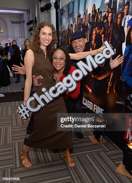 Actresses Rachel DiPillo and S. Epatha Merkerson hold a #ChicagoMed hashtag as they attend a press junket for NBC's 'Chicago Fire', 'Chicago P.D.'...