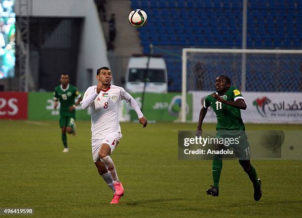 Sameh Maraaba of Palestinian national team and Abdulmalek Abdullah Al Khaibri of Saudi Arabia contest the ball during the AFC qualifying Group A...