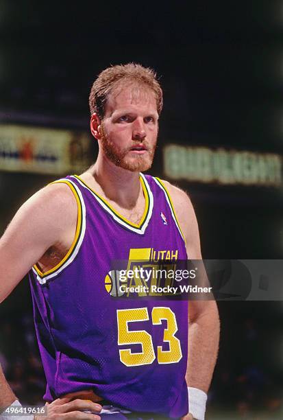 Mark Eaton of the Utah Jazz looks on against the Sacramento Kings circa 1992 at Arco Arena in Sacramento, California. NOTE TO USER: User expressly...