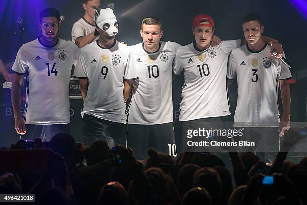 Emre Can, Cro, Lukas Podolski, guest and Jonas Hector attend the 'Die Mannschaft' Kit Presentation at The Base on November 9, 2015 in Berlin, Germany.