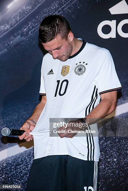 Lukas Podolski attends the 'Die Mannschaft' Kit Presentation at The Base on November 9, 2015 in Berlin, Germany.