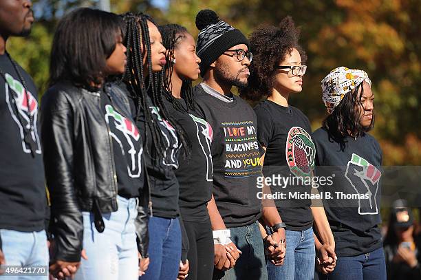 Jonathan Butler , a University of Missouri grad student who did a 7 day hunger strike listens during a forum speaking to students on the campus of...