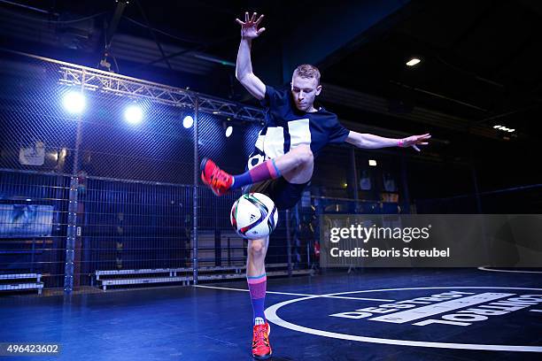 Two trick footballers perform at the adidas presentation of the new DFB home jersey for UEFA EURO 2016 at The Base on November 9, 2015 in Berlin,...