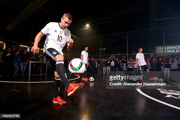 Lukas Podolski is seen at the adidas presentation of new DFB home jersey for UEFA EURO 2016 at The Base on November 9, 2015 in Berlin, Germany.