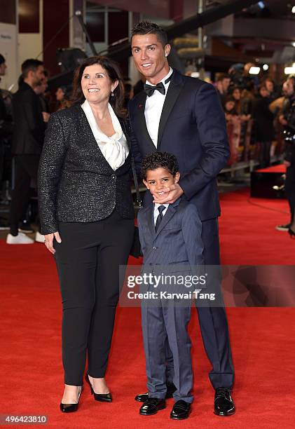 Maria Dolores dos Santos Aveiro, Cristiano Ronaldo and son Cristiano Ronaldo Jnr attend the World Premiere of "Ronaldo" at Vue West End on November...