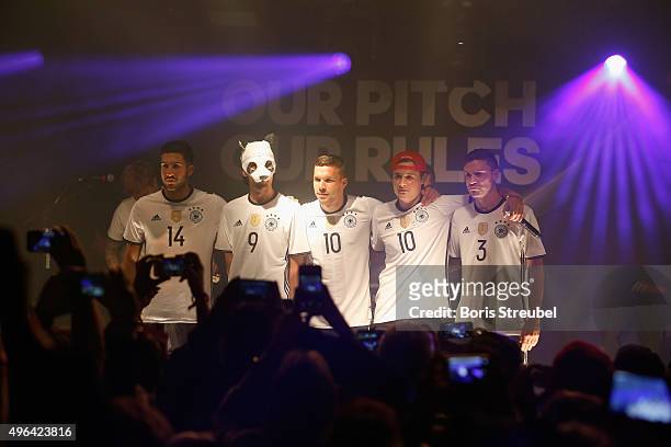 Cro, Emre Can, Lukas Podolski, Dajuan and Jonas Hector attend the adidas presentation of new DFB home jersey for UEFA EURO 2016 at The Base on...
