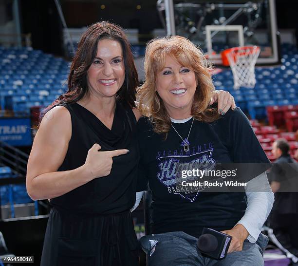 Sacramento Kings assistant coach Nancy Lieberman meets with Arizona Cardinal assistant coach Jen Welter prior to the Sacramento Kings game against...