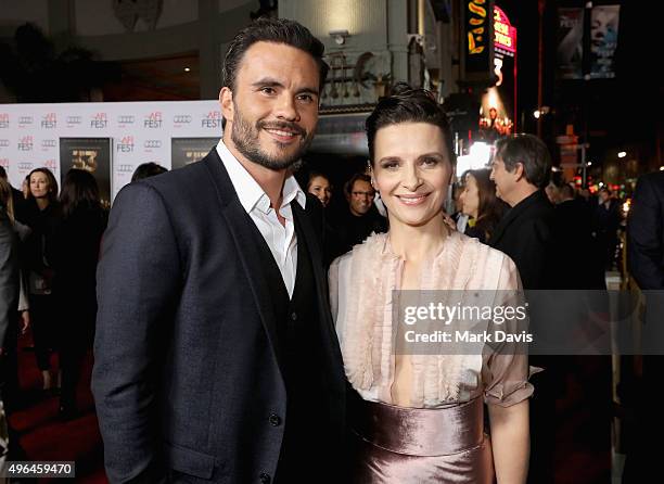 Actors Juan Pablo Raba and Juliette Binoche attend the Centerpiece Gala Premiere of Alcon Entertainment's "The 33" during AFI FEST 2015 presented by...