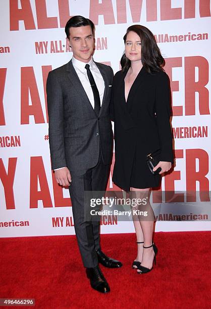 Actor Finn Wittrock and wife actress Sarah Roberts attend the premiere of Clarius Entertainment's 'My All American' at The Grove on November 9, 2015...