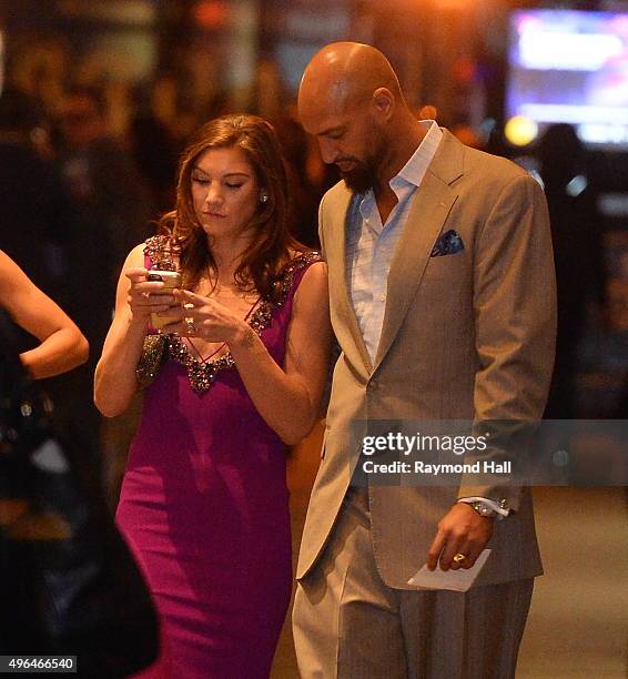 HopeSolo and Jerramy Stevens are seen outside Carnegie Hall in Midtown on on November 9, 2015 in New York City.