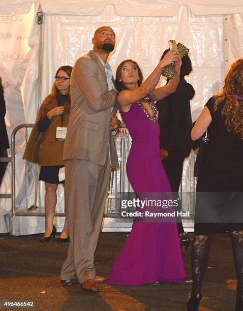 HopeSolo and Jerramy Stevens are seen outside Carnegie Hall in Midtown on on November 9, 2015 in New York City.