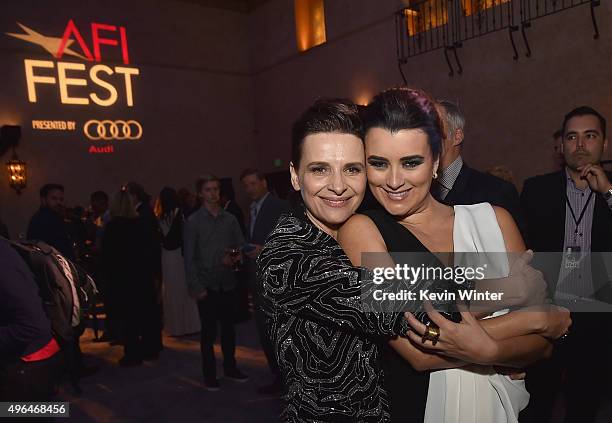 Actresses Juliette Binoche and Cote de Pablo attend the after party for the Centerpiece Gala Premiere of Alcon Entertainment's "The 33" during AFI...