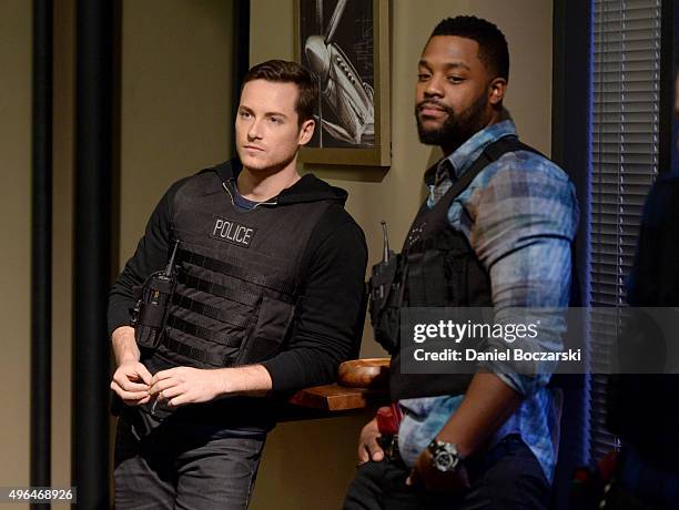 Actors Jesse Lee Soffer and Laroyce Hawkins perform an on set demonstration of "Chicago P.D." during the press junket for NBC's 'Chicago Fire',...