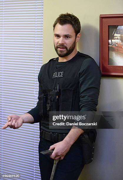 Actor Patrick John Flueger performs an on set demonstration of "Chicago P.D." during the press junket for NBC's 'Chicago Fire', 'Chicago P.D.' and...