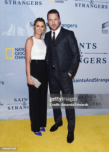 Actor Barry Sloane and Katy O'Grady arrive at the premiere of National Geographic Channel's "Saints And Strangers" at the Saban Theatre on November...