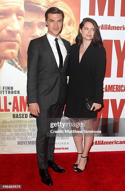 Actor Finn Wittrock and Sarah Roberts attend the premiere of Clarius Entertainment's "My All American" at The Grove on November 9, 2015 in Los...