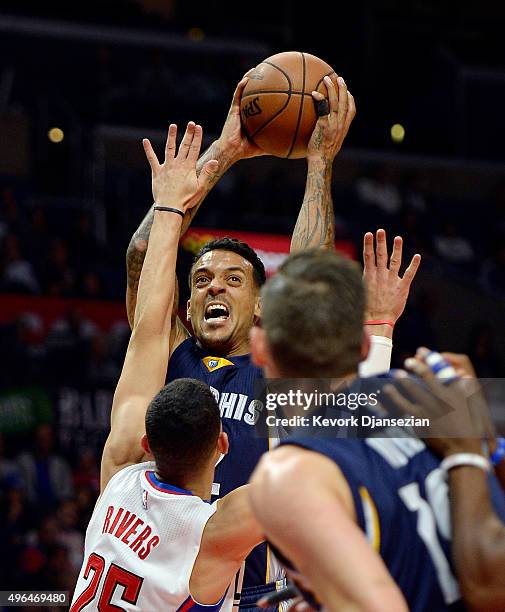 Matt Barnes of the Memphis Grizzlies shoots a basket over Austin Rivers of the Los Angeles Clippers during the second half of the basketball game at...