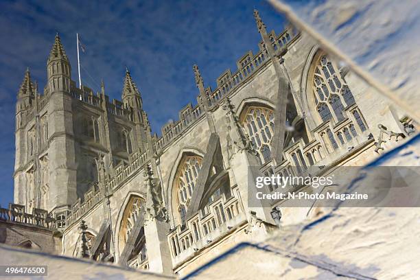 The Abbey Church of Saint Peter and Saint Paul, better known as Bath Abbey, reflected in a puddle, taken on January 14, 2014.