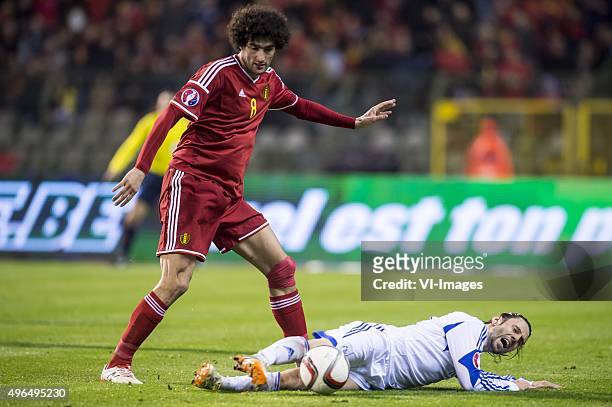 Marouane Fellaini of Belgium, Vincent Laban of Cyprus during the UEFA EURO 2016 qualifying match between Belgium and Cyprus on March 28, 2015 at the...