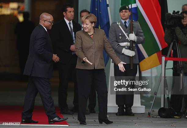 German Chancellor Angela Merkel welcomes South African President Jacob Zuma upon Zuma's arrival at the Chancellery on November 10, 2015 in Berlin,...