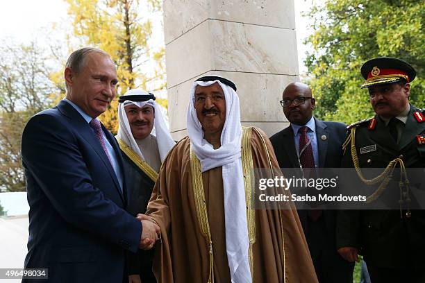Russian President Vladimir Putin greets Emir of Kuwait Sabah Al-Ahmad Al-Jaber Al-Sabah in Bocharov Ruchey State Residence on November 10 in Sochi,...