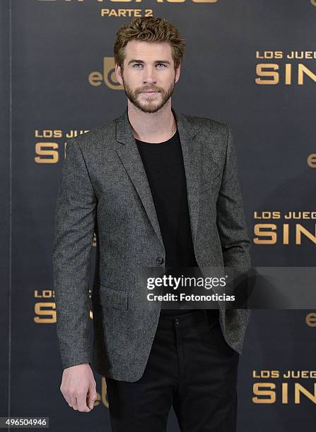 Actor Liam Hemsworth attends a photocall for 'The Hunger Games: Mockingjay - Part 2' at the Villamagna Hotel on November 10, 2015 in Madrid, Spain.