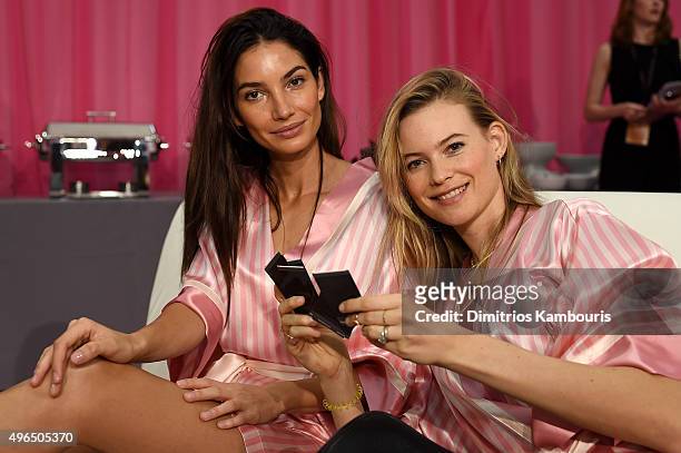 Lily Aldridge and Behati Prinsloo are seen backstage before the 2015 Victoria's Secret Fashion Show at Lexington Avenue Armory on November 10, 2015...