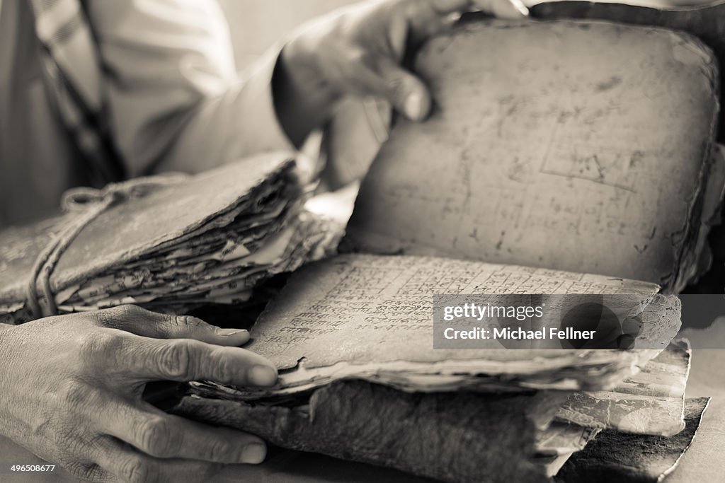 Man reading in Hindu scriptures - Nepal