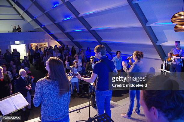 praiseband having a concert. - the voice television show stock pictures, royalty-free photos & images