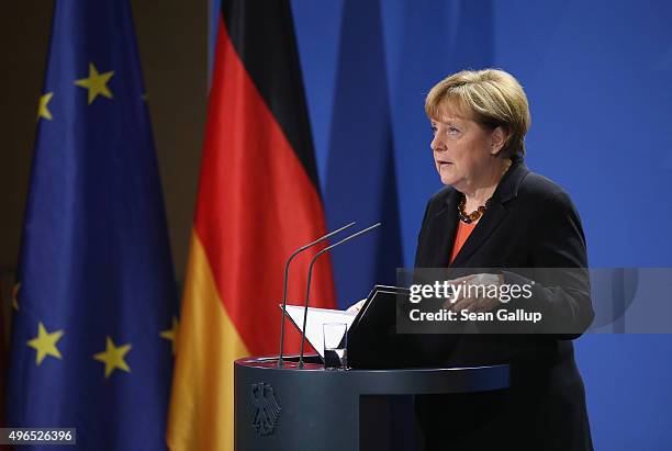 German Chancellor Angela Merkel gives a statement to the media following news earlier in the day that former German Chancellor Helmut Schmidt has...