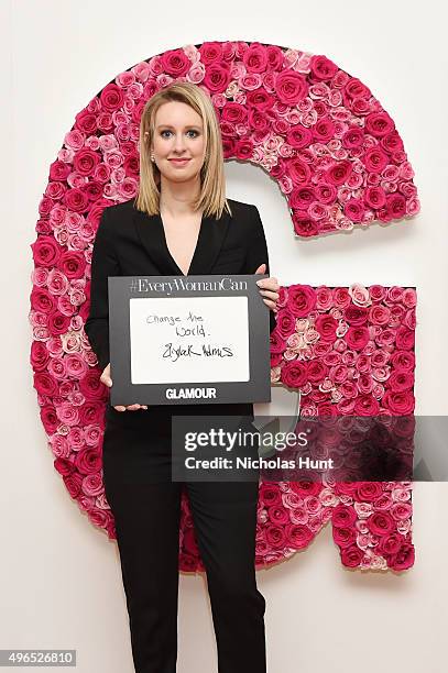 Honoree Elizabeth Holmes poses for a photo at the backstage inspiration wall at the 2015 Glamour Women of the Year Awards at Carnegie Hall on...