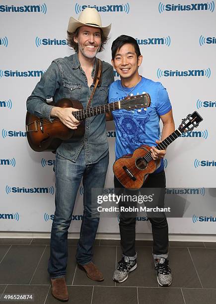 Dave Rawlings and Jake Shimabukuro visits at SiriusXM Studios on November 10, 2015 in New York City.