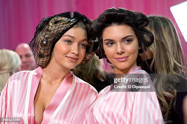 Gigi Hadid and Kendall Jenner are seen backstage at the 2015 Victoria's Secret Fashion Show at the Lexington Armory on November 10, 2015 in New York...