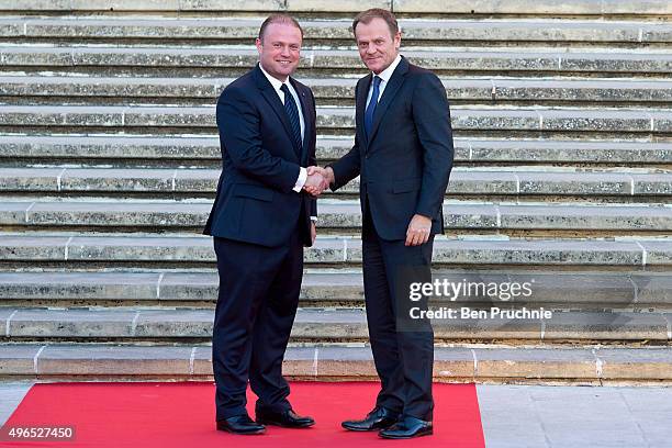 Prime Minister of Malta Joseph Muscat greets President of the European Council Donald Tusk at the Auberge de Castille ahead of the Valletta Summit on...