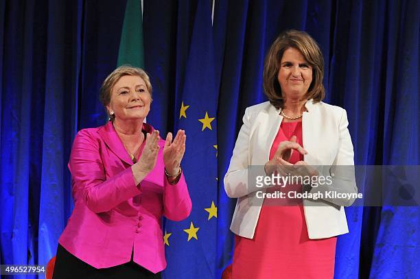 The Irish Minister for Justice and Equality, Frances Fitzgerald applauds alongside Tanaiste Joan Burton after signing the commencement order for the...