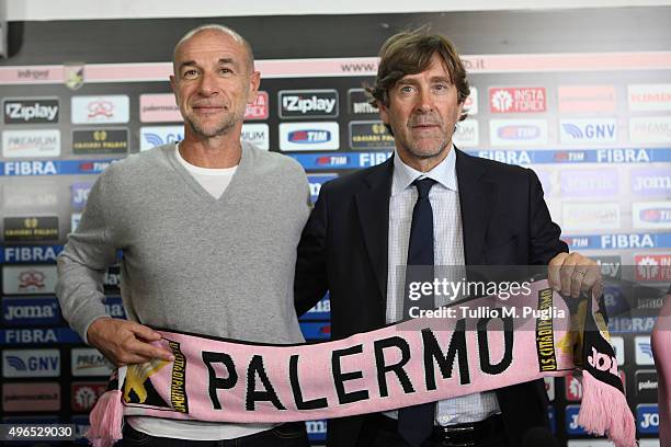 Davide Ballardini new head coach of Palermo poses with Sport Manager Manuel Gerolin during his presentation at Stadio Renzo Barbera on November 10,...