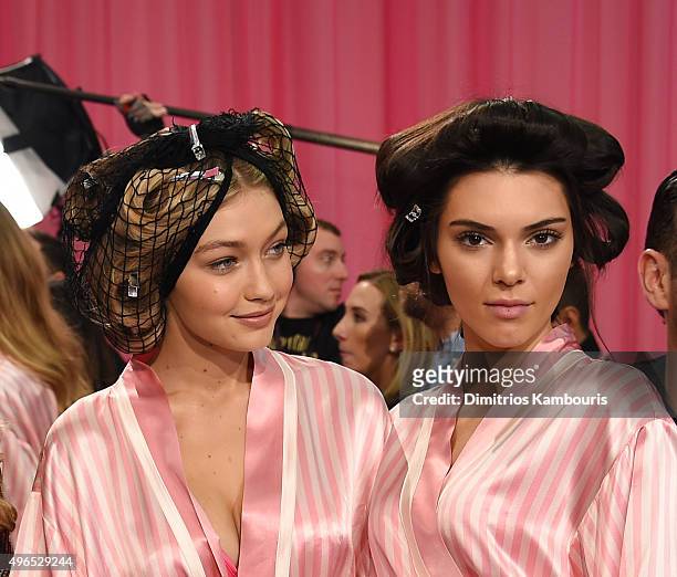 Gigi Hadid and Kendall Jenner are seen backstage before the 2015 Victoria's Secret Fashion Show at Lexington Avenue Armory on November 10, 2015 in...
