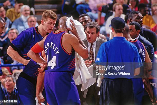 Charles Barkley of the Phoenix Suns stands in the huddle against the Sacramento Kings circa 1993 at Arco Arena in Sacramento, California. NOTE TO...
