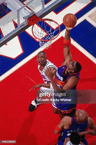 Oliver Miller of the Phoenix Suns shoots against the Sacramento Kings circa 1993 at Arco Arena in Sacramento, California. NOTE TO USER: User...