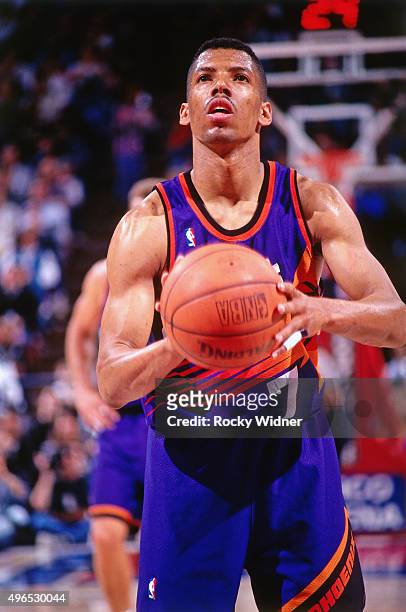 Kevin Johnson of the Phoenix Suns shoots a foul shot against the Sacramento Kings circa 1993 at Arco Arena in Sacramento, California. NOTE TO USER:...
