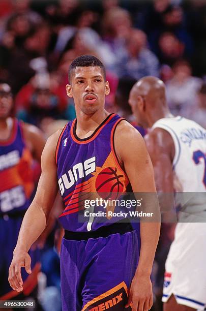 Kevin Johnson of the Phoenix Suns looks on against the Sacramento Kings circa 1993 at Arco Arena in Sacramento, California. NOTE TO USER: User...