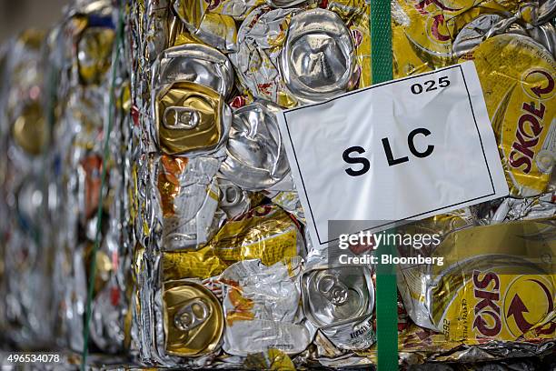 Bales of aluminium can sit in a warehouse after being unloaded from a truck at the Latasa Reciclagem SA collection center in Pindamonhangaba, Brazil,...