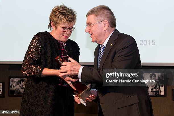 President Thomas Bach awards New Zealand Olympic Committee General Secretary Kereyn Smith with the IOC International Women In Sport World trophy...