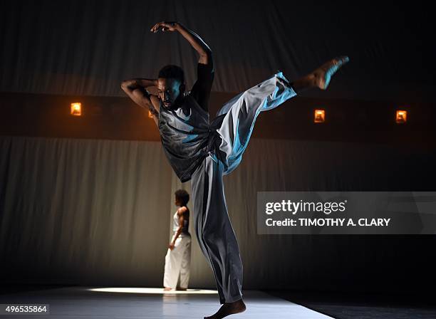 Dancers Tamisha Guy and Jeremy "Jae" Neal with Abraham.In.Motion perform a scene from "Absent Matter" during a dress rehearsal before opening night...