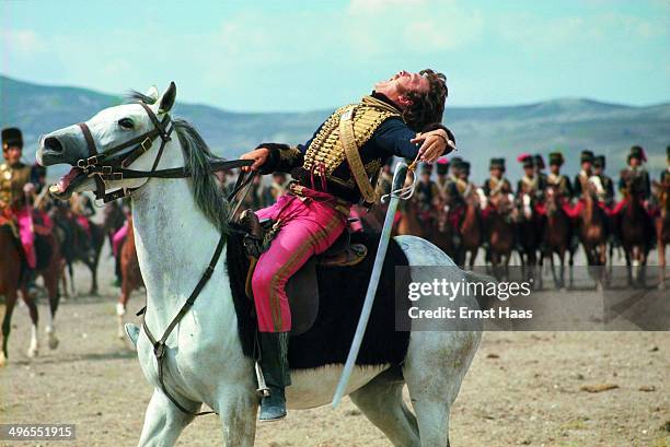 English actor David Hemmings films his death scene for the film 'The Charge of the Light Brigade', on location in Turkey, 1967.