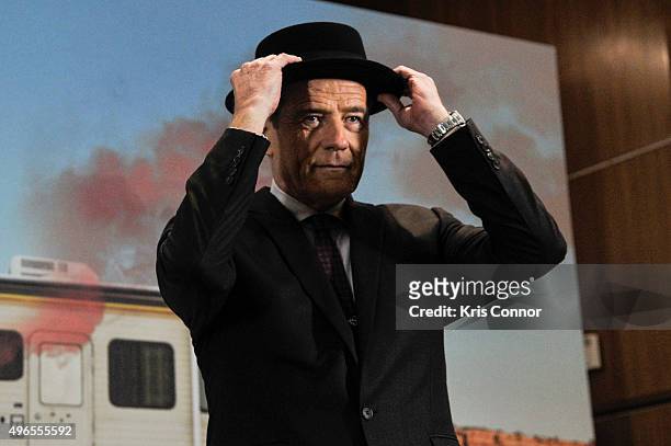 Actor Bryan Cranston speaks with his "The Heisenberg Hat" on during a donation ceremony of artifacts from AMC's "Breaking Bad" show at Smithsonian's...