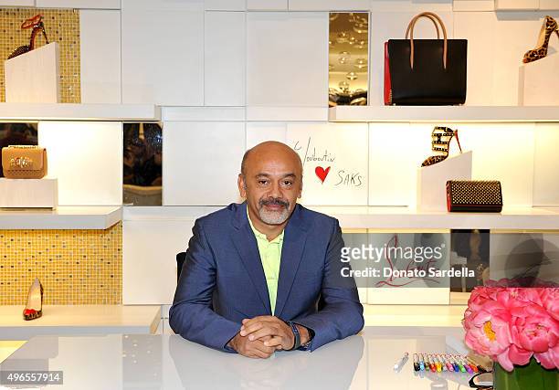 Designer Christian Louboutin is pictures at his personal appearance and shoe signing at Saks Fifth Avenue Beverly Hills on November 10, 2015 in...