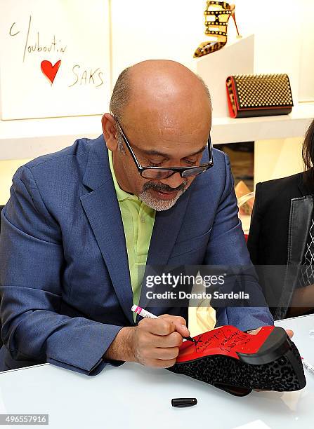 Designer Christian Louboutin is pictures at his personal appearance and shoe signing at Saks Fifth Avenue Beverly Hills on November 10, 2015 in...