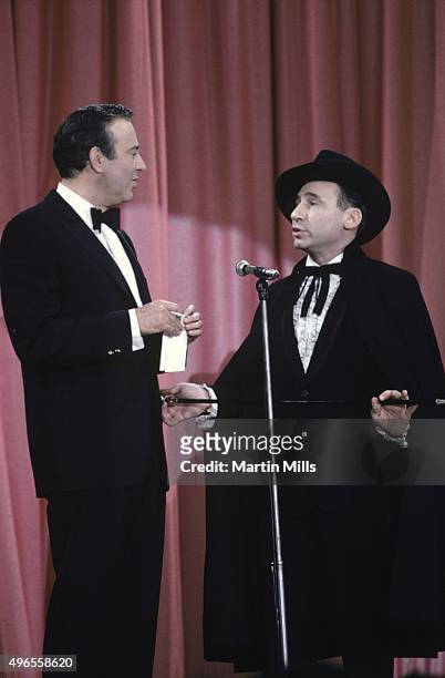 Comedians, writers and directors Carl Reiner and Mel Brooks perform their routine 'The 2000 Year Old Man' circa 1967 in Los Angeles, California.